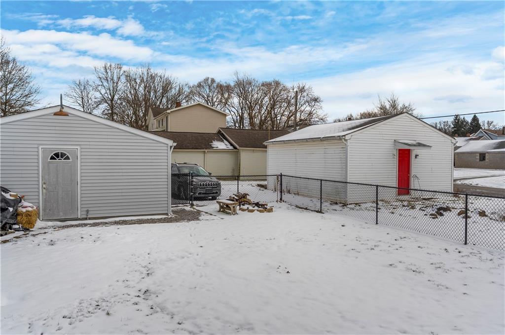 1571 West Ridge Avenue Sharpsville, PA 16150 - Photo 12 of 30 a view of a house with wooden fence