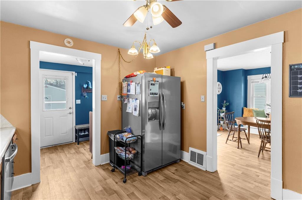1571 West Ridge Avenue Sharpsville, PA 16150 - Photo 18 of 30 a view of a dining room with furniture window and wooden floor