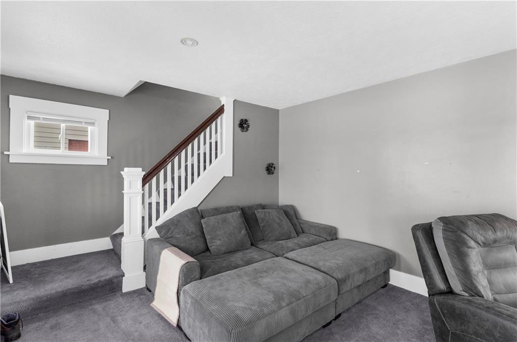 1571 West Ridge Avenue Sharpsville, PA 16150 - Photo 24 of 30 a living room with furniture and a window