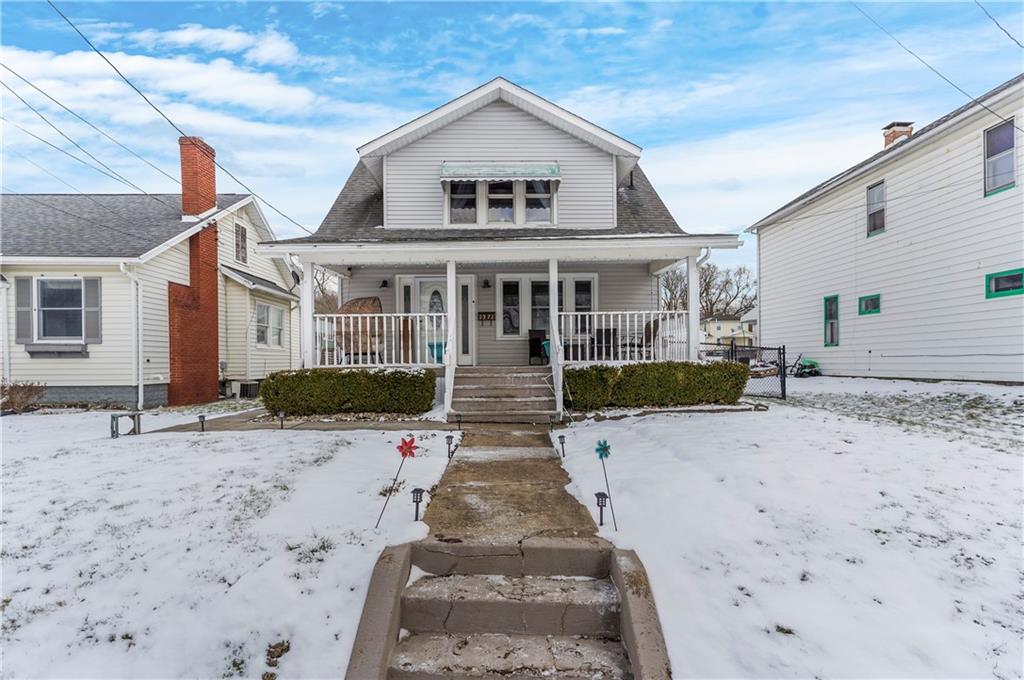 1571 West Ridge Avenue Sharpsville, PA 16150 - Photo 4 of 30 a view of a house with wooden fence