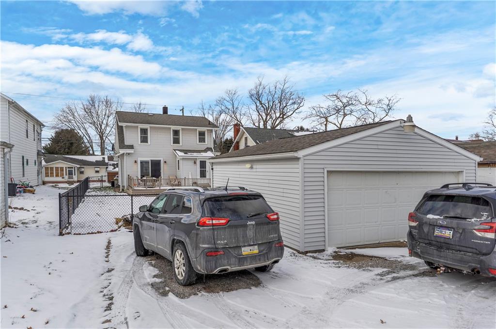 1571 West Ridge Avenue Sharpsville, PA 16150 - Photo 8 of 30 a car parked in front of a house