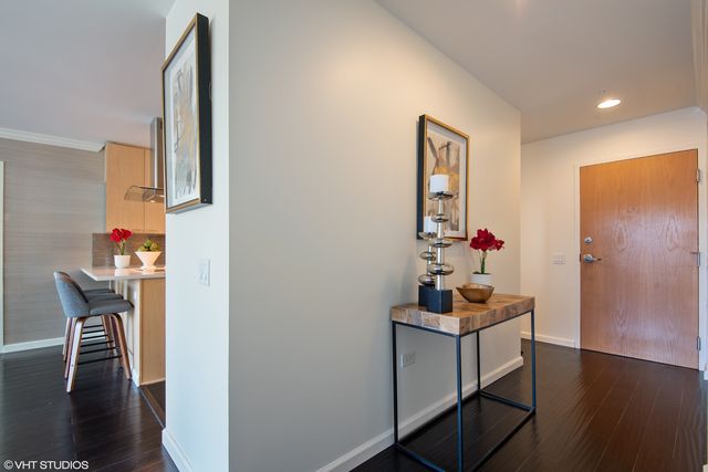 a room with furniture and wooden floor