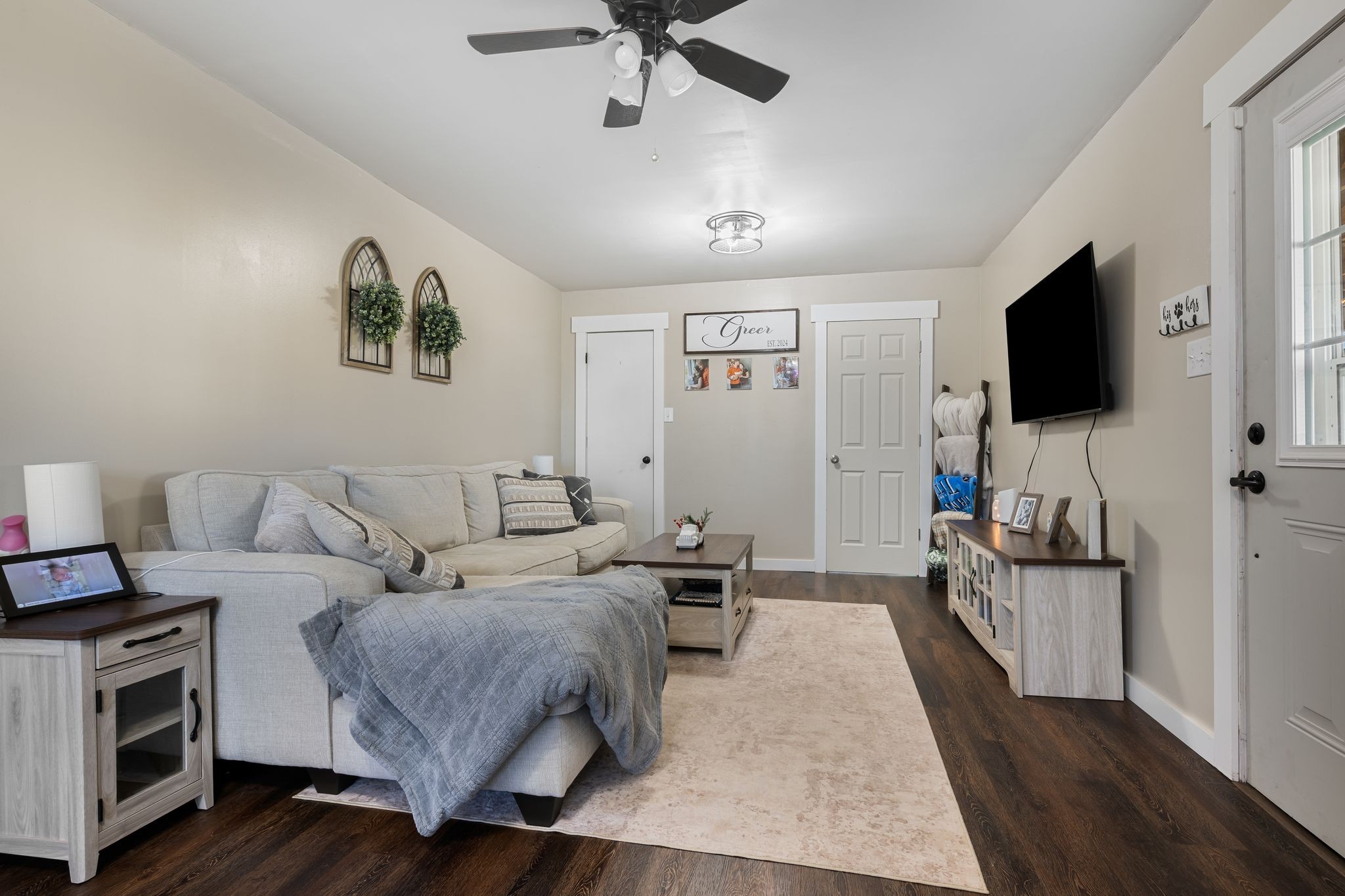 3205 Sylvia Road Dickson, TN 37055 - Photo 12 of 26 a living room with furniture and a flat screen tv