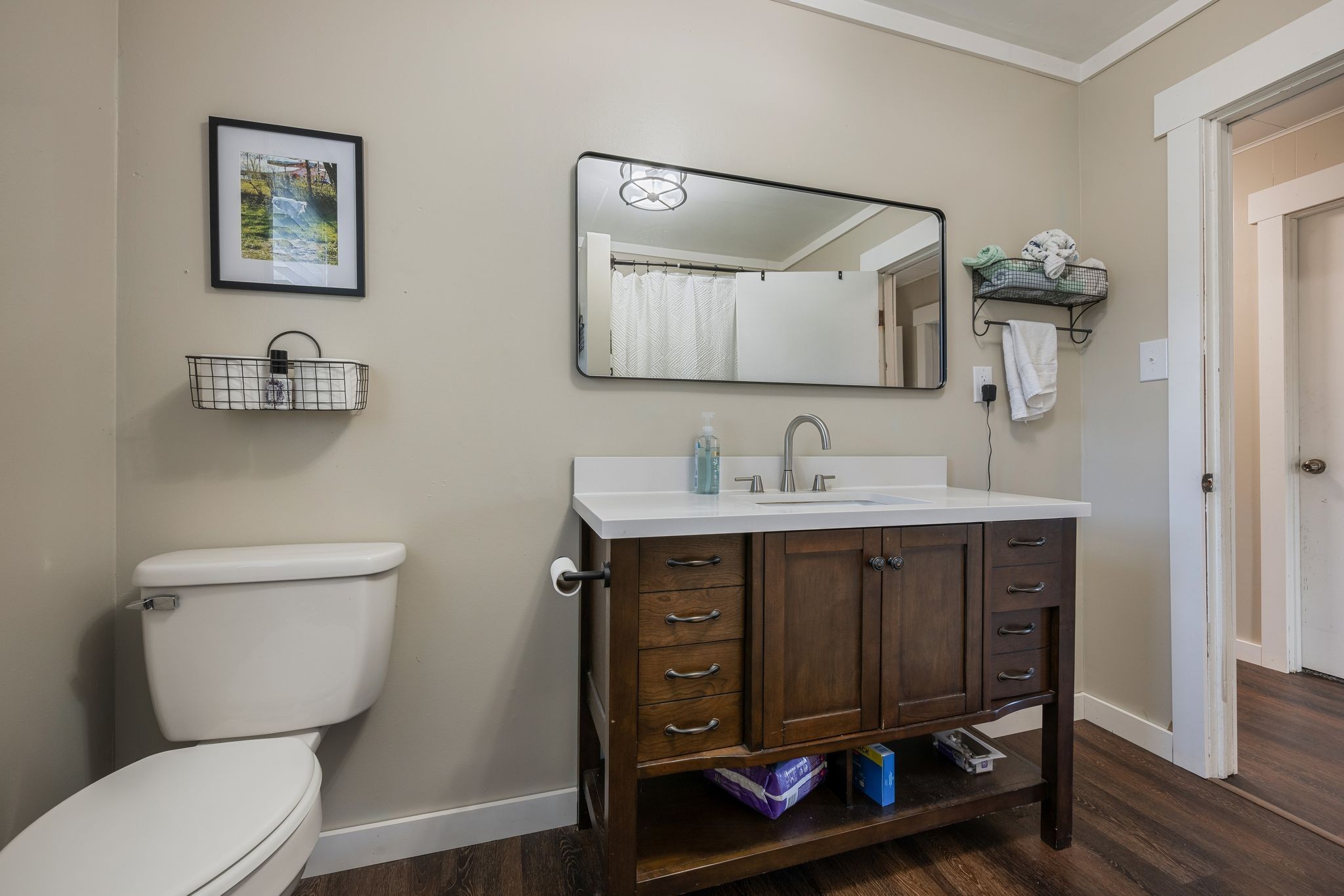 3205 Sylvia Road Dickson, TN 37055 - Photo 20 of 26 a bathroom with a toilet a sink and mirror