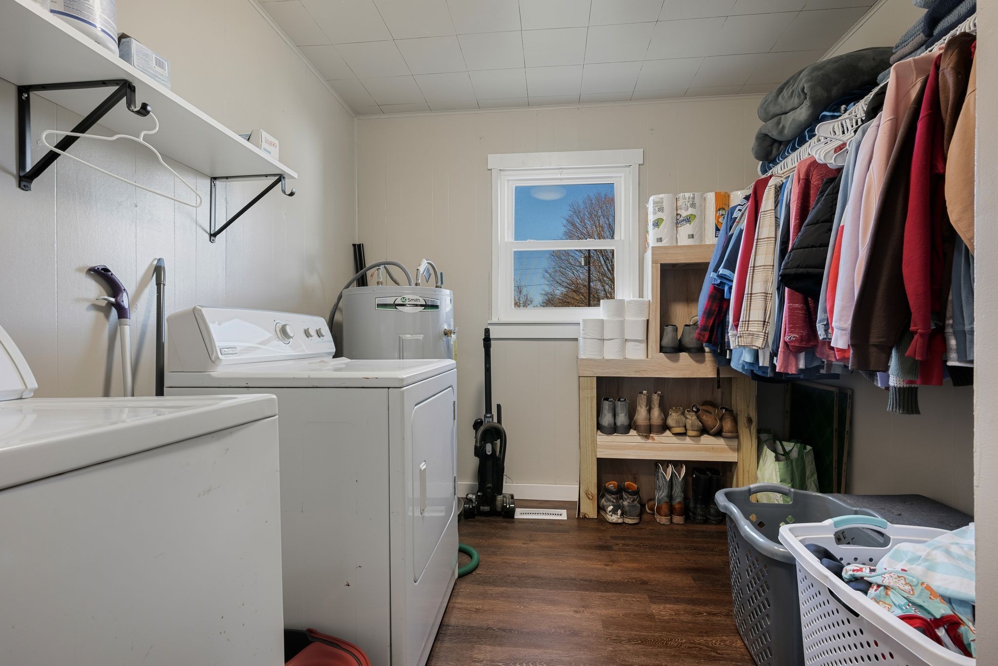 3205 Sylvia Road Dickson, TN 37055 - Photo 21 of 26 a view of walk in closet with clothes and shoes