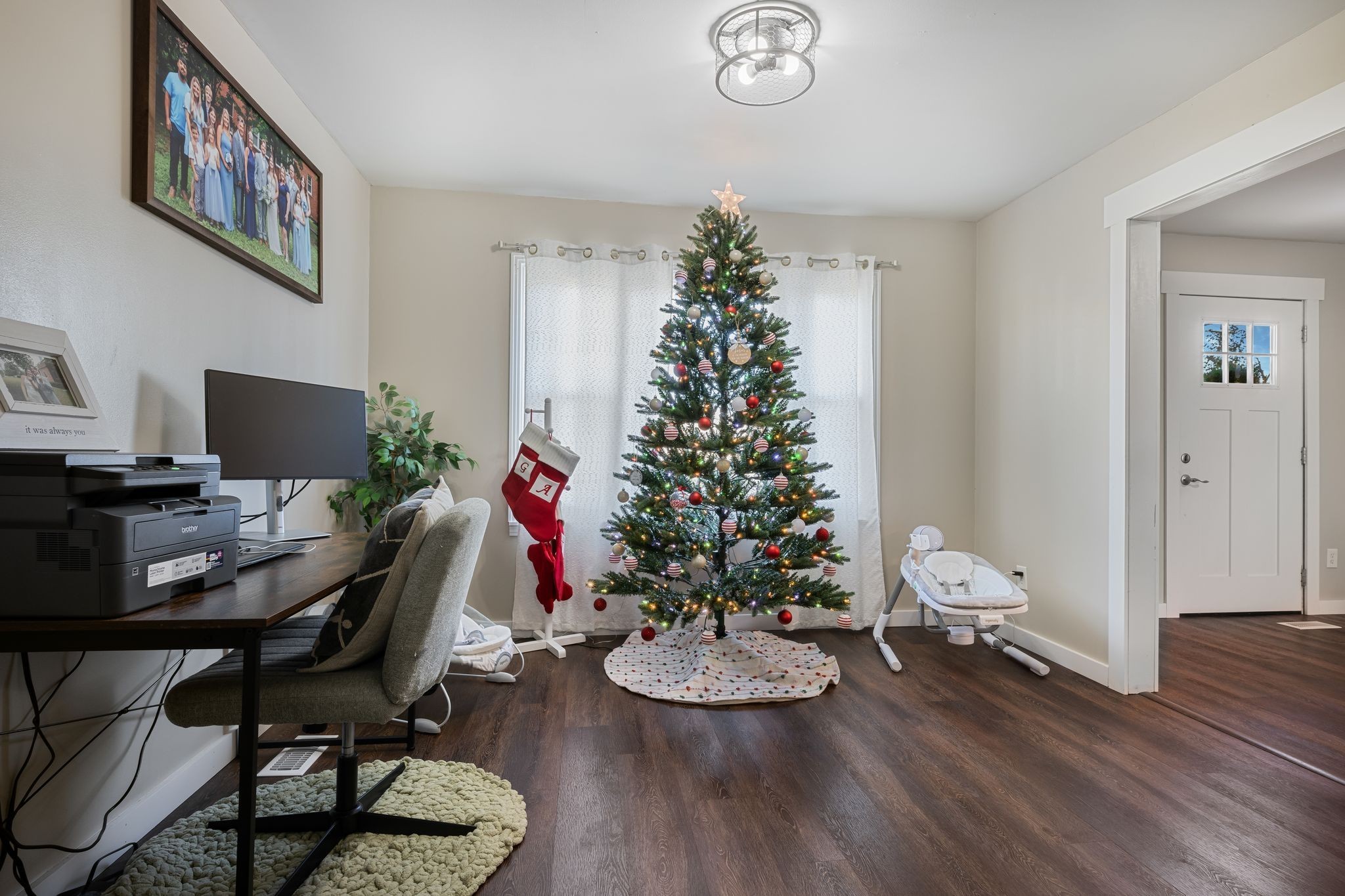 3205 Sylvia Road Dickson, TN 37055 - Photo 10 of 26 a view of a workspace with furniture window and wooden floor