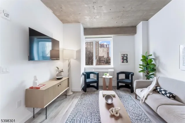 a living room with furniture and window