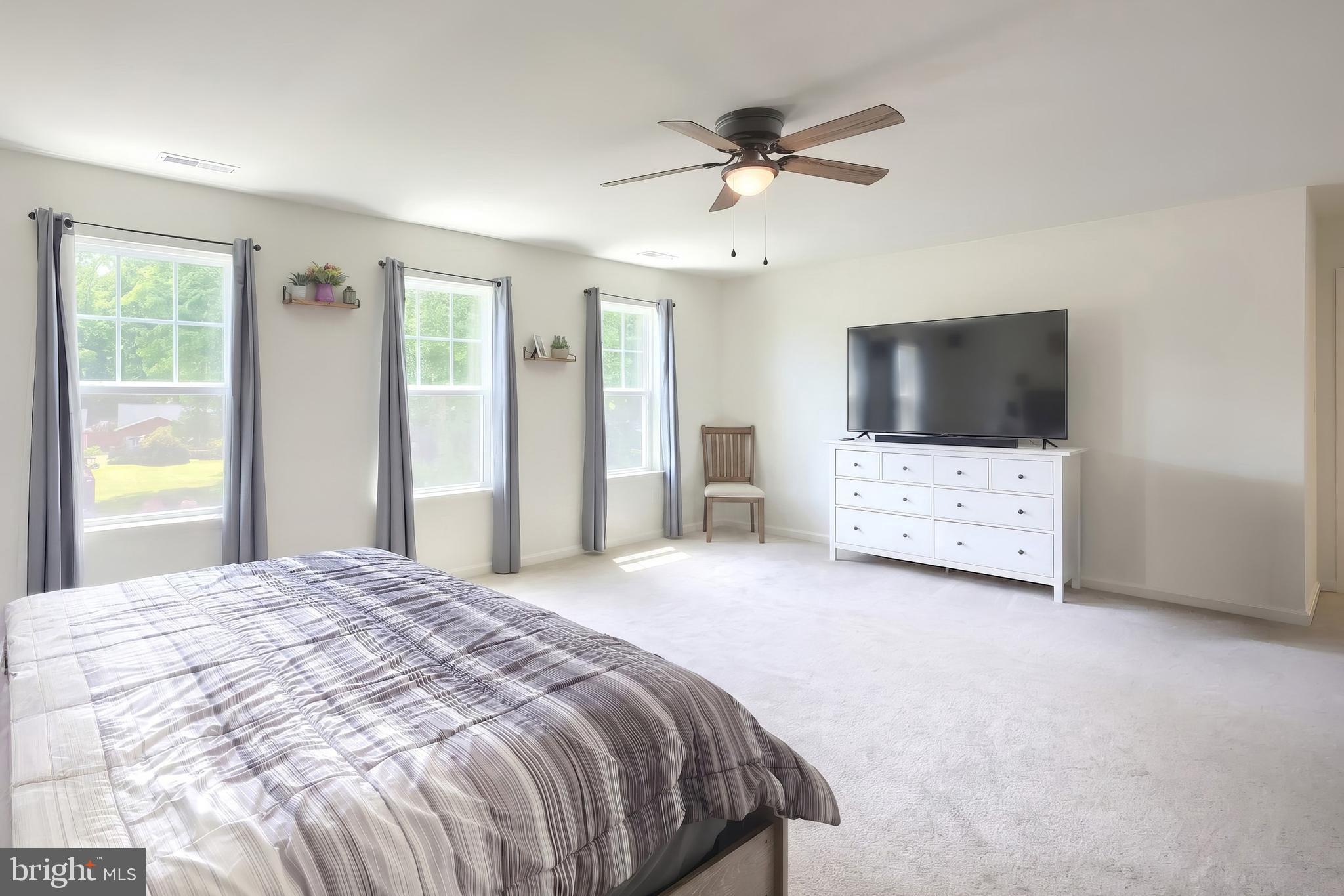 2741 Cold Springs Road Orrtanna, PA 17353 - Photo 33 of 52 a bedroom with a bed and a flat screen tv
