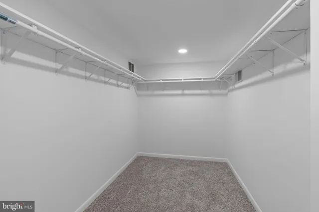 a view of a room with racks on the wall