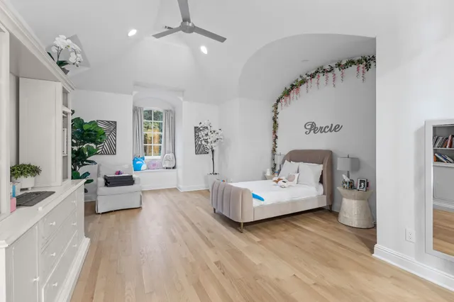 a view of a building with a bench in a patio