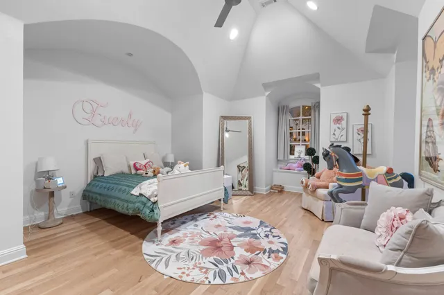 a large building with trees in front of it