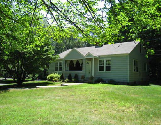 4 Birch Lane Ridgefield, CT 06877 - Photo 1 of 1 a view of house with yard and outdoor seating