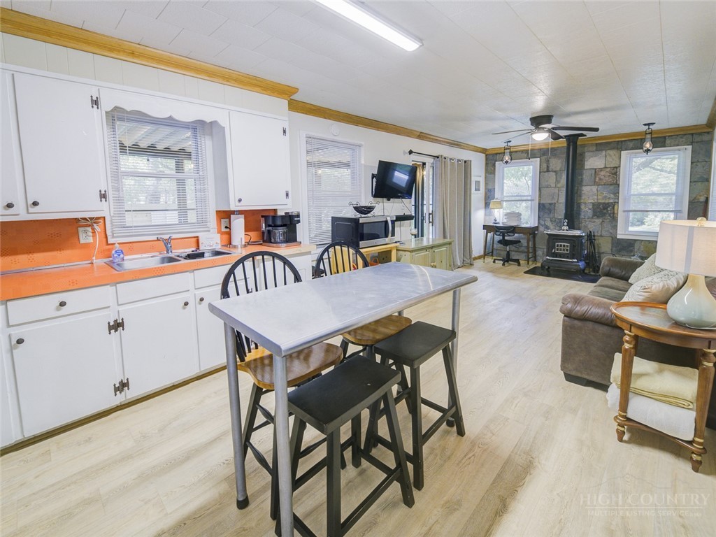 1471 Bamboo Road Boone, NC 28607 - Photo 6 of 19 a view of kitchen with cabinets and wooden floor