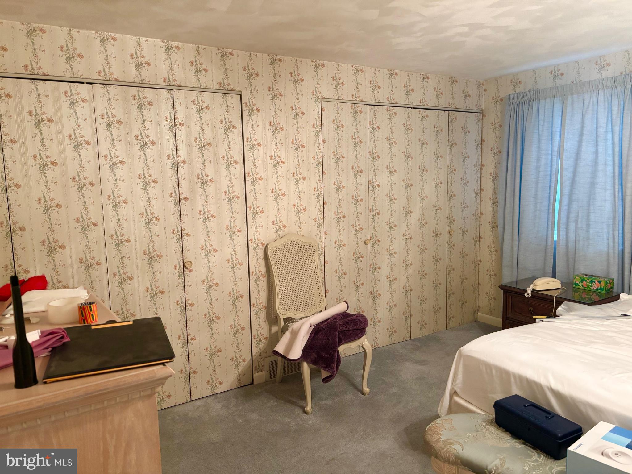 12517 Ramer Road Philadelphia, PA 19154 - Photo 11 of 24 a bedroom with a bed and a chair