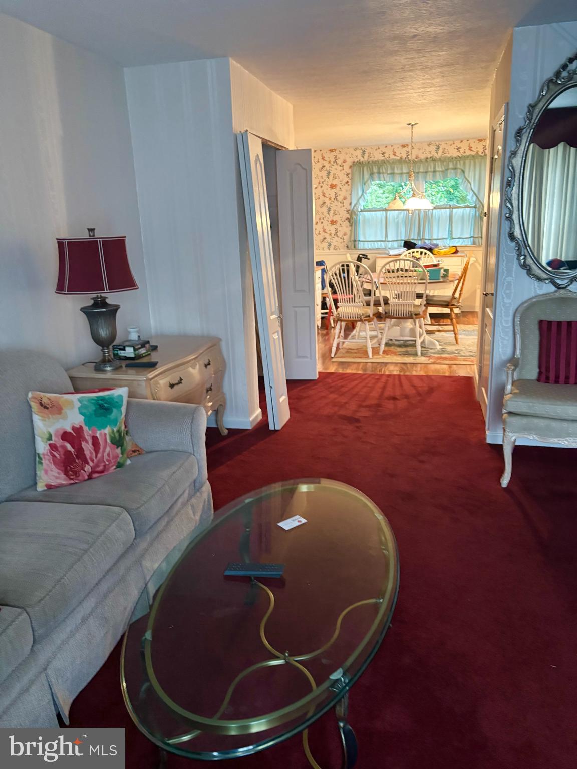 12517 Ramer Road Philadelphia, PA 19154 - Photo 2 of 24 a living room with furniture and a floor to ceiling window
