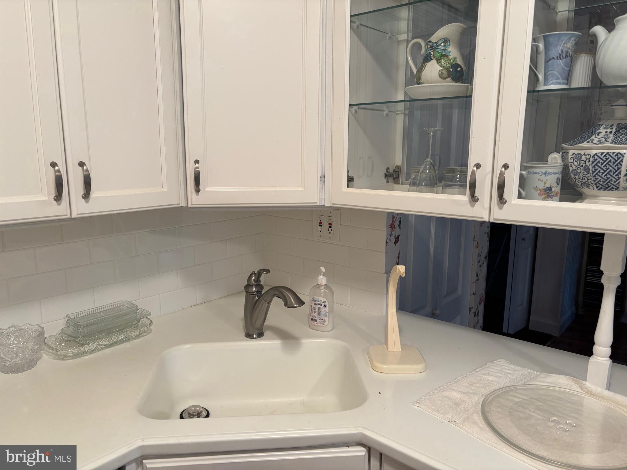 12517 Ramer Road Philadelphia, PA 19154 - Photo 6 of 24 a bathroom with a sink and a mirror