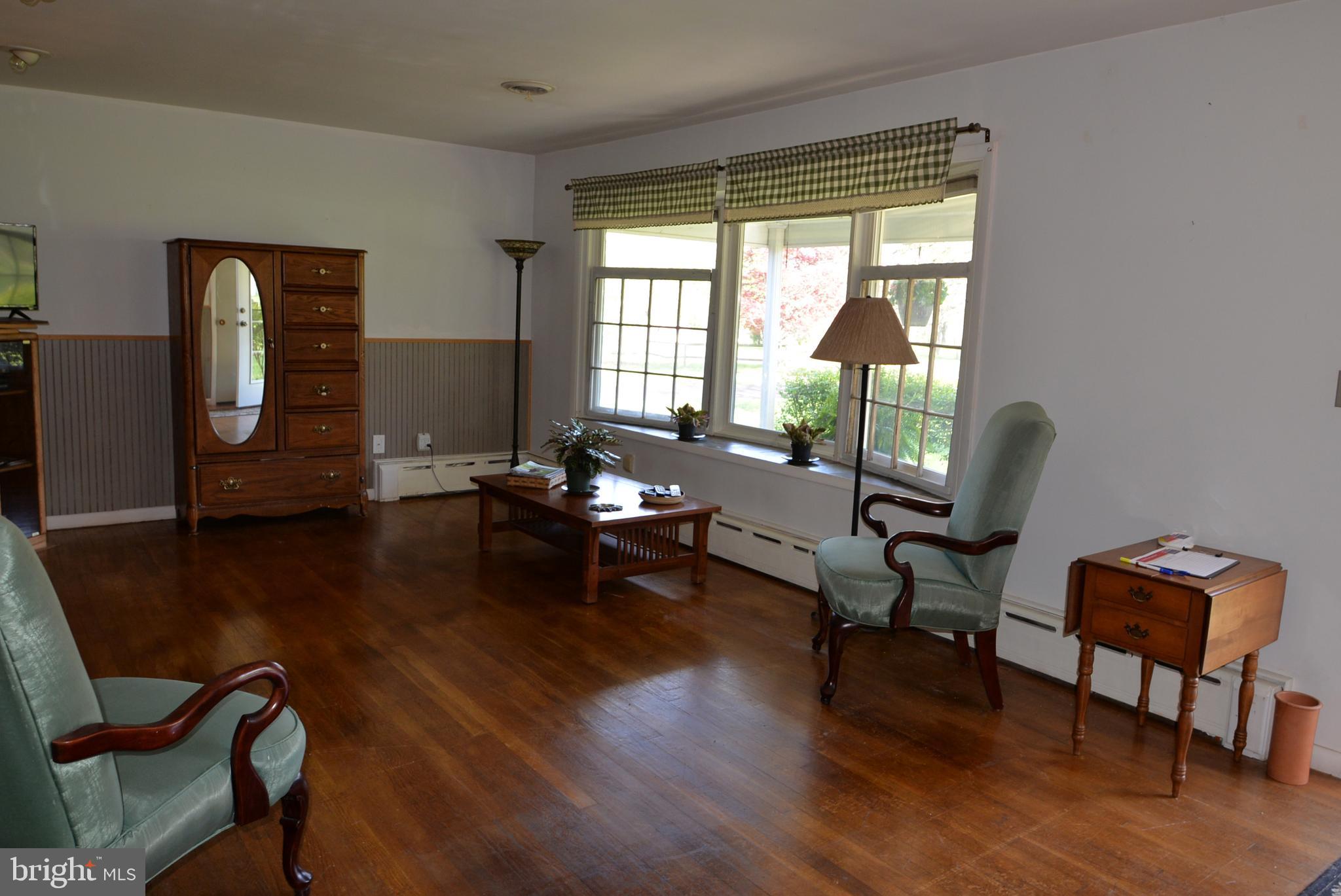 973 West Thatcher Road Quakertown, PA 18951 - Photo 6 of 16 Living Room with fireplace and views