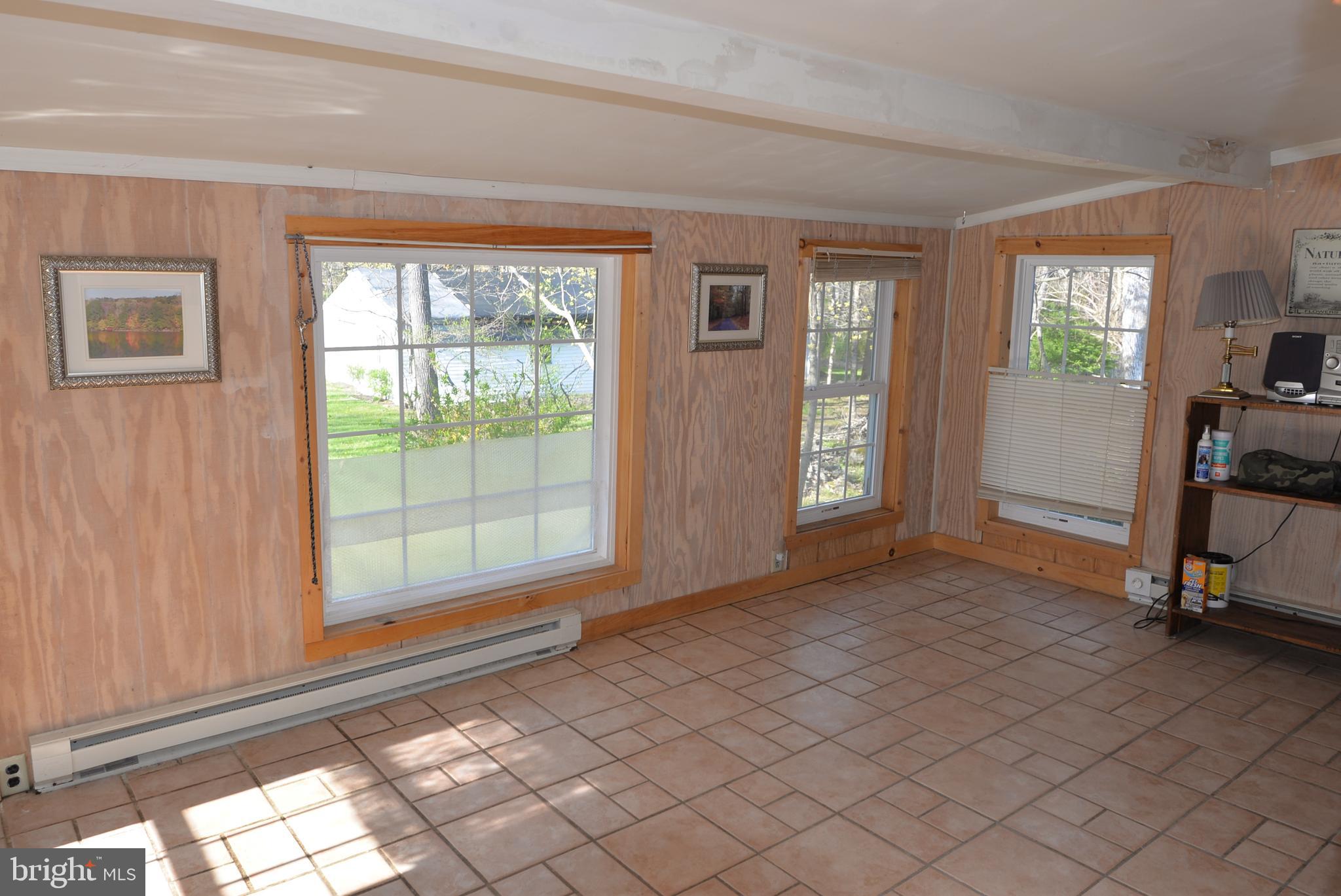 973 West Thatcher Road Quakertown, PA 18951 - Photo 8 of 16 Play room/Sunroom with outside access