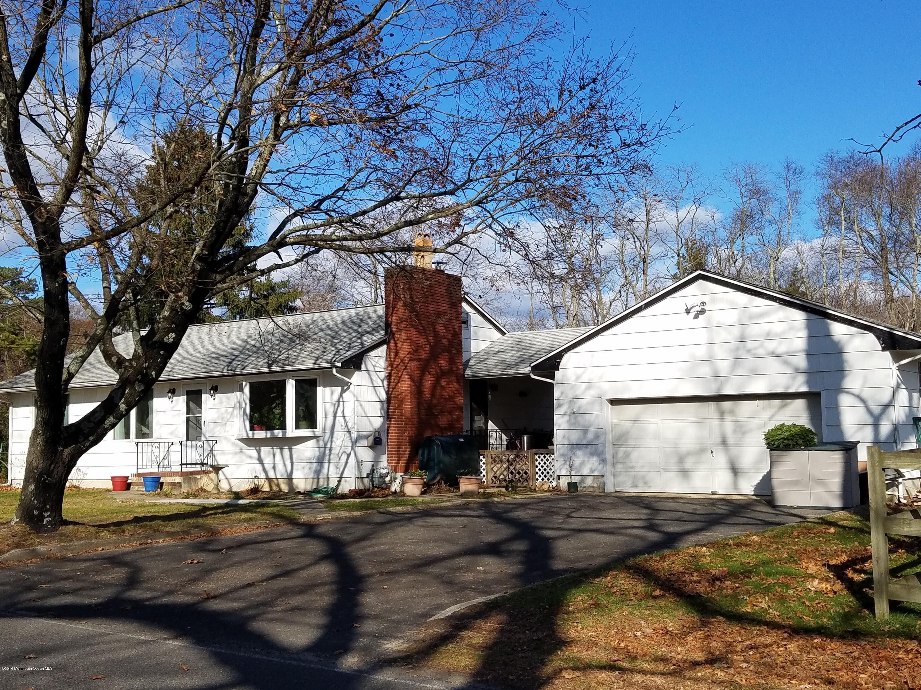 a front view of a house with street