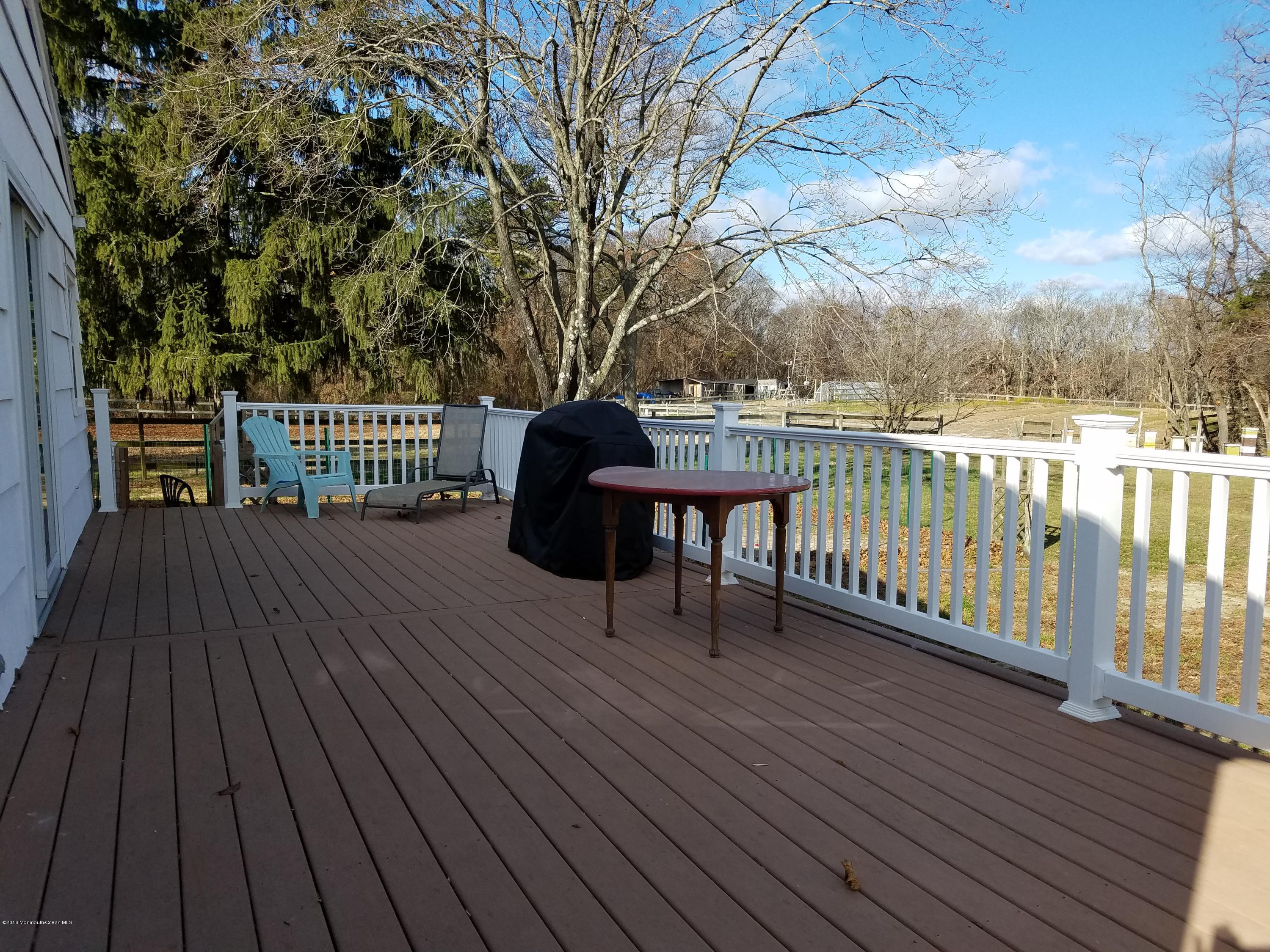 117 Maxim Road Howell, NJ 07731 - Photo 18 of 28 a view of a balcony with furniture