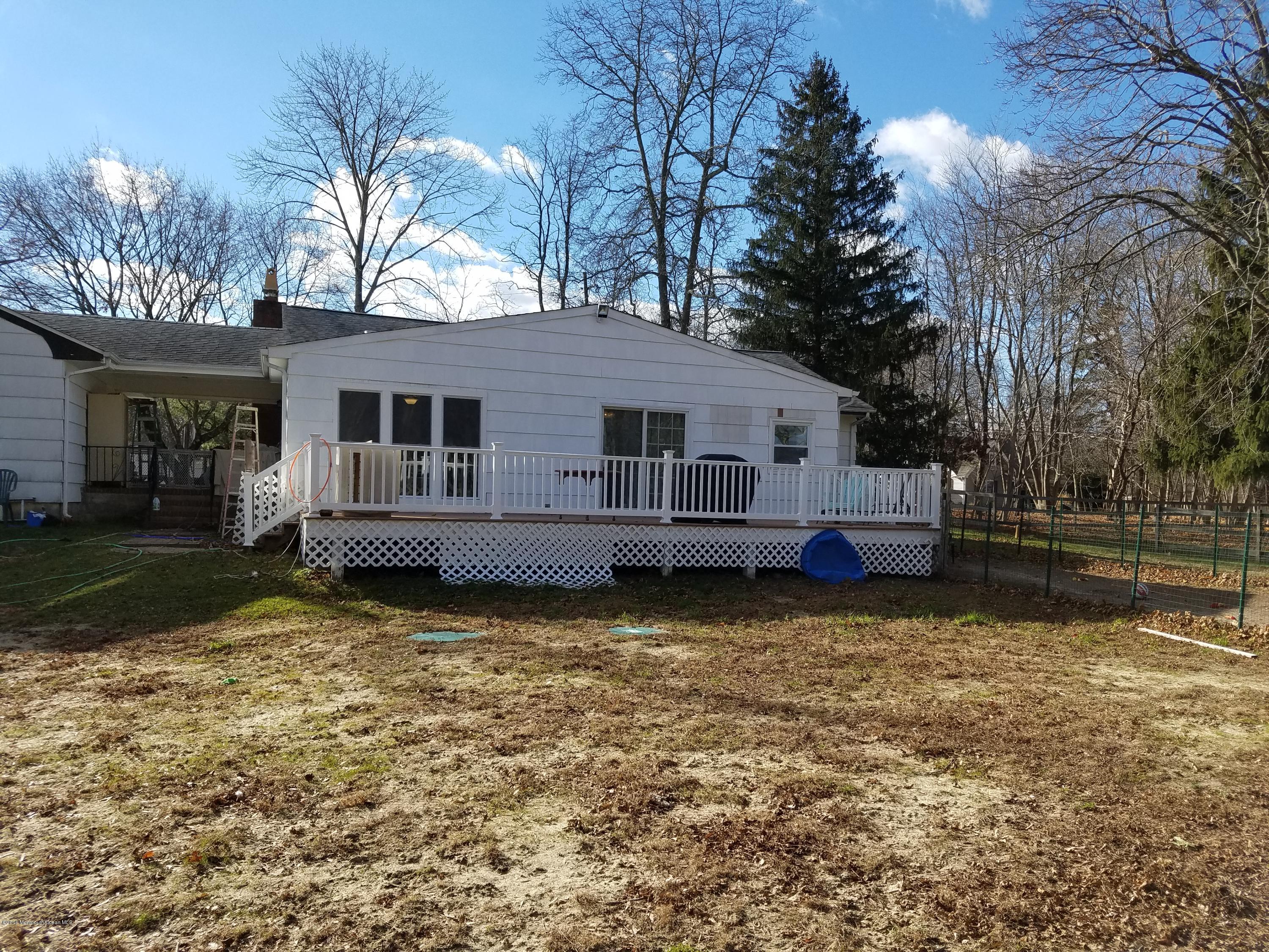 117 Maxim Road Howell, NJ 07731 - Photo 2 of 28 a view of a house with backyard and sitting area