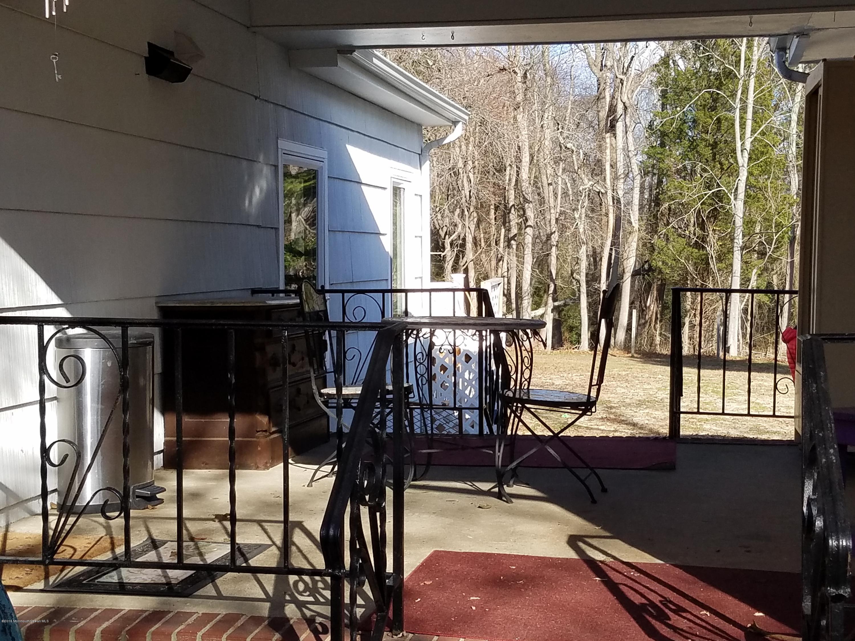 117 Maxim Road Howell, NJ 07731 - Photo 3 of 28 a view of swimming pool with seating area