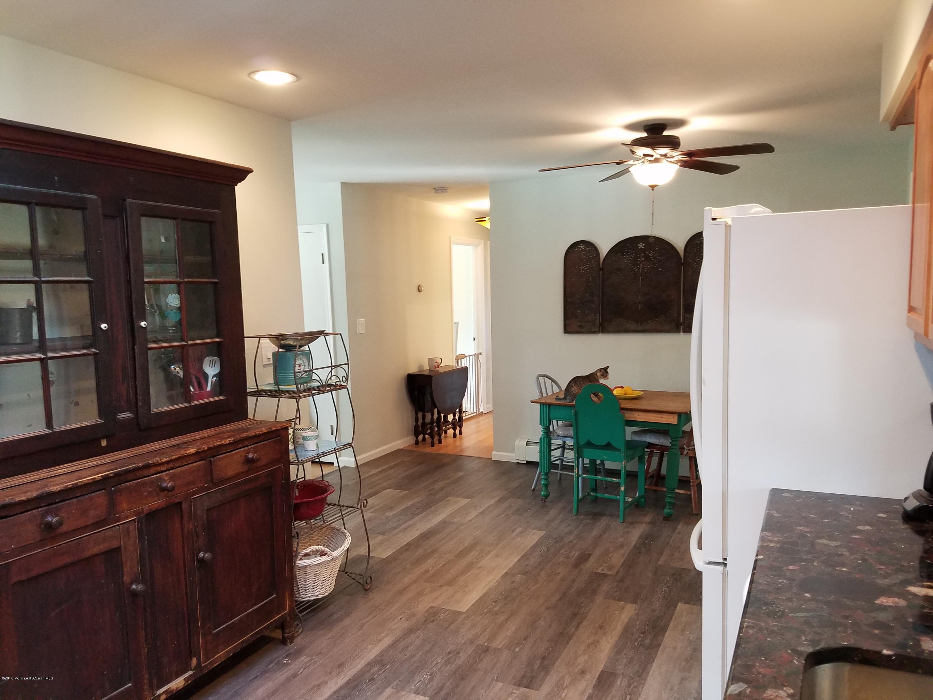 117 Maxim Road Howell, NJ 07731 - Photo 5 of 28 a view of living room with furniture and wooden floor