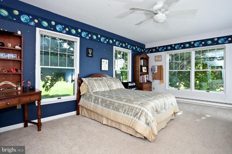 3754 Black Rock Road Upperco, MD 21155 - Photo 11 of 18 a bedroom with a large bed and a window