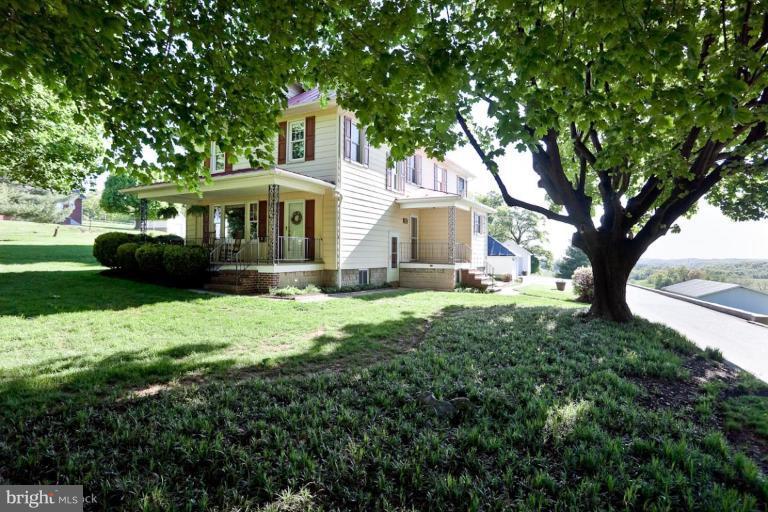 3754 Black Rock Road Upperco, MD 21155 - Photo 18 of 18 a front view of a house with yard and green space