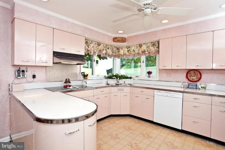 3754 Black Rock Road Upperco, MD 21155 - Photo 8 of 18 a kitchen with a sink stove and cabinets