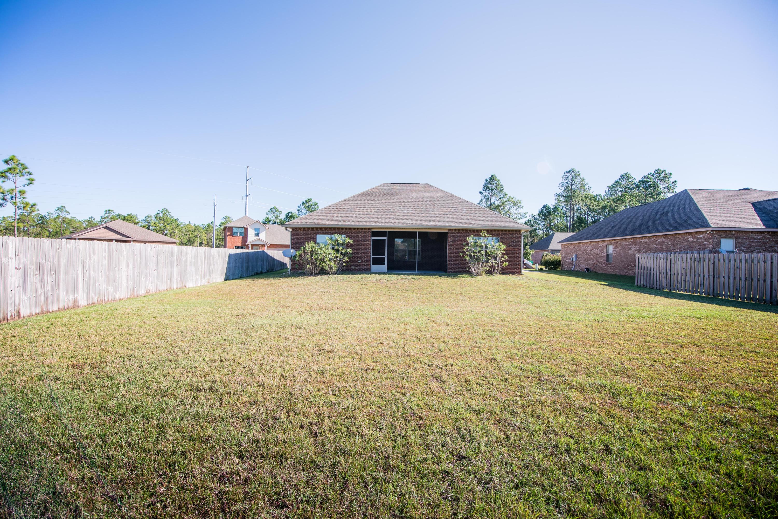 125 Kinley Avenue Santa Rosa Beach, FL 32459 - Photo 33 of 33 View of house from back yard