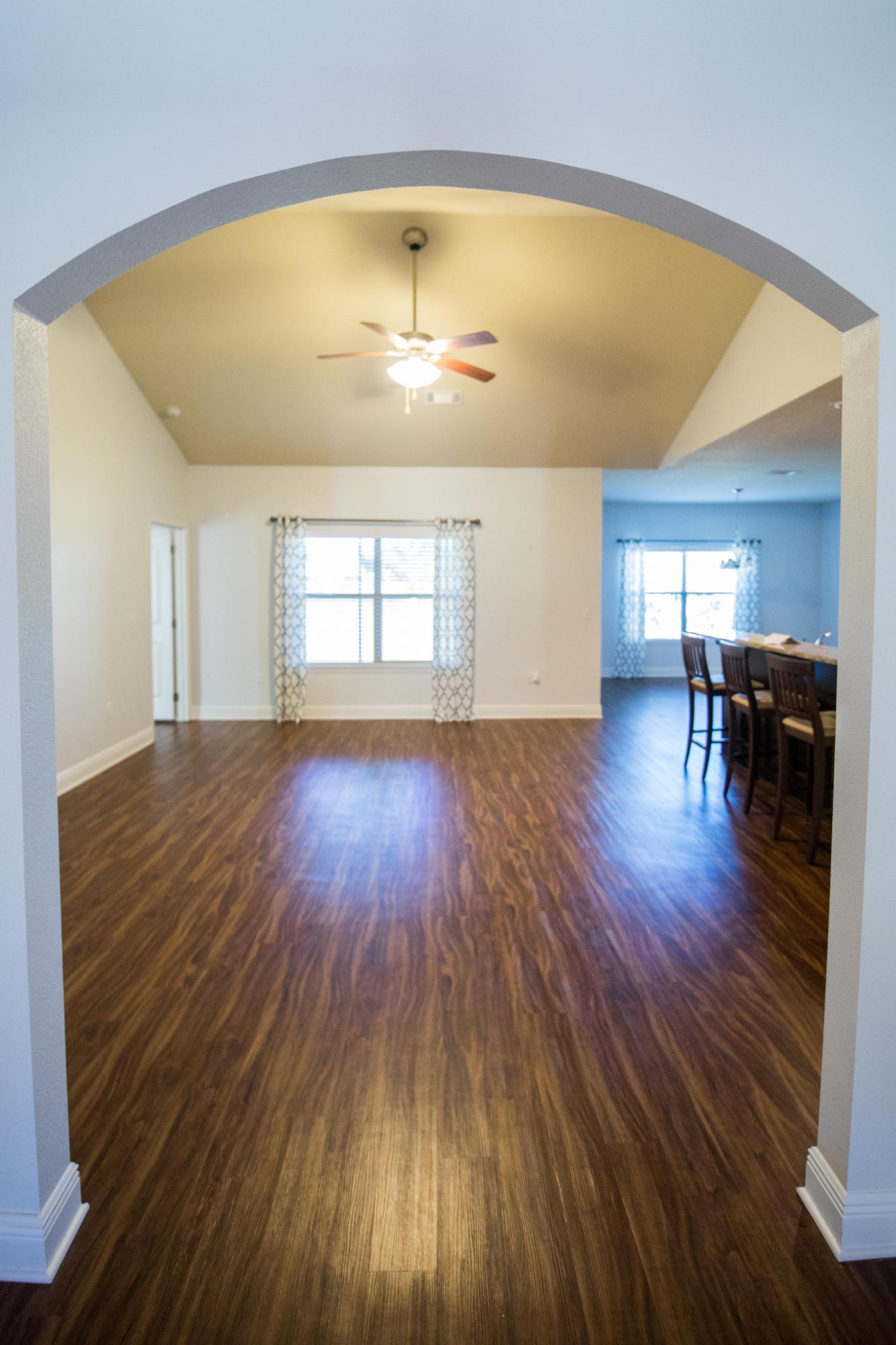 125 Kinley Avenue Santa Rosa Beach, FL 32459 - Photo 8 of 33 Archway leading you into the family room