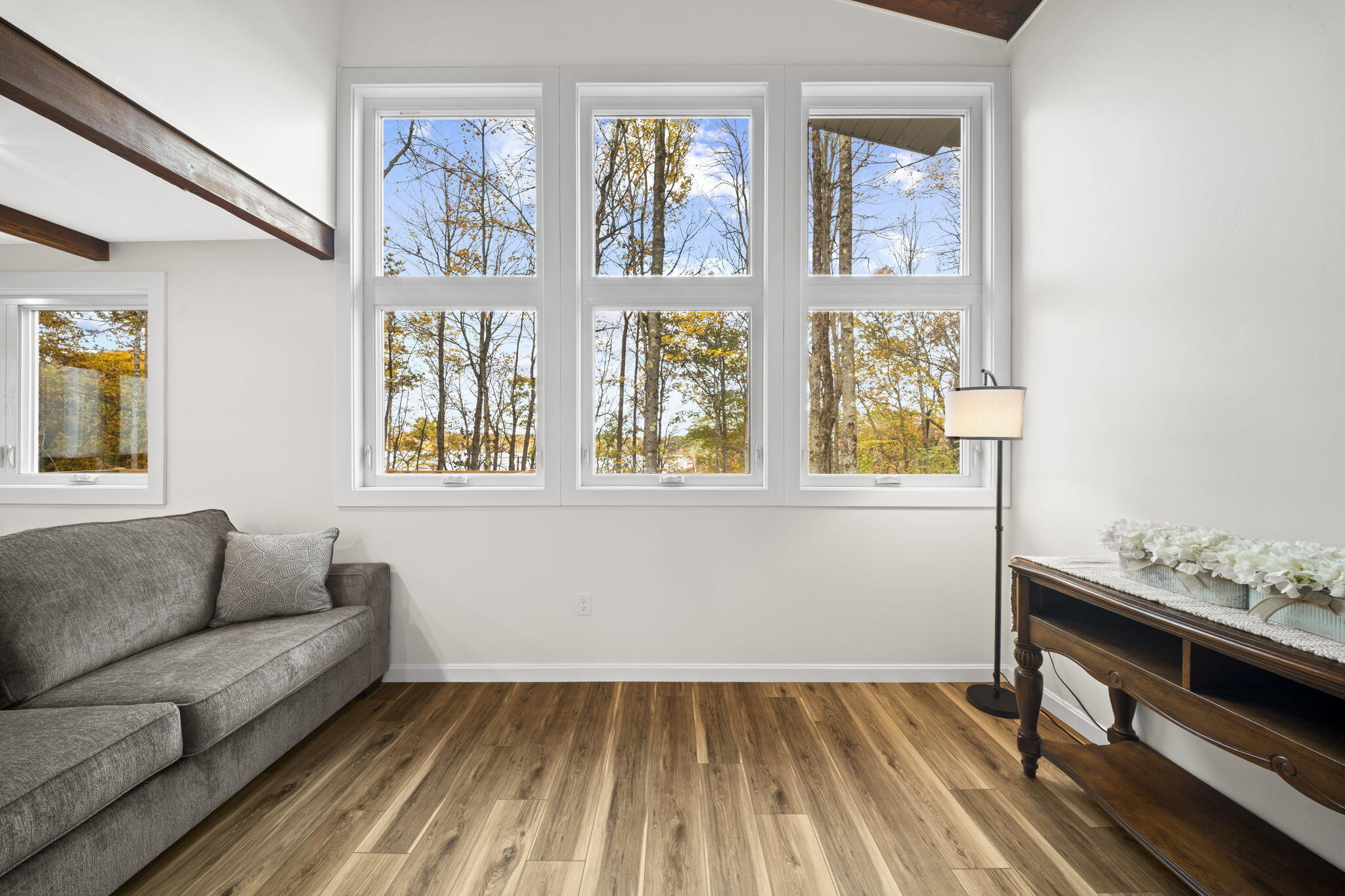 59 34th Fire Road South China, ME 04358 - Photo 24 of 39 Sunlit Living room