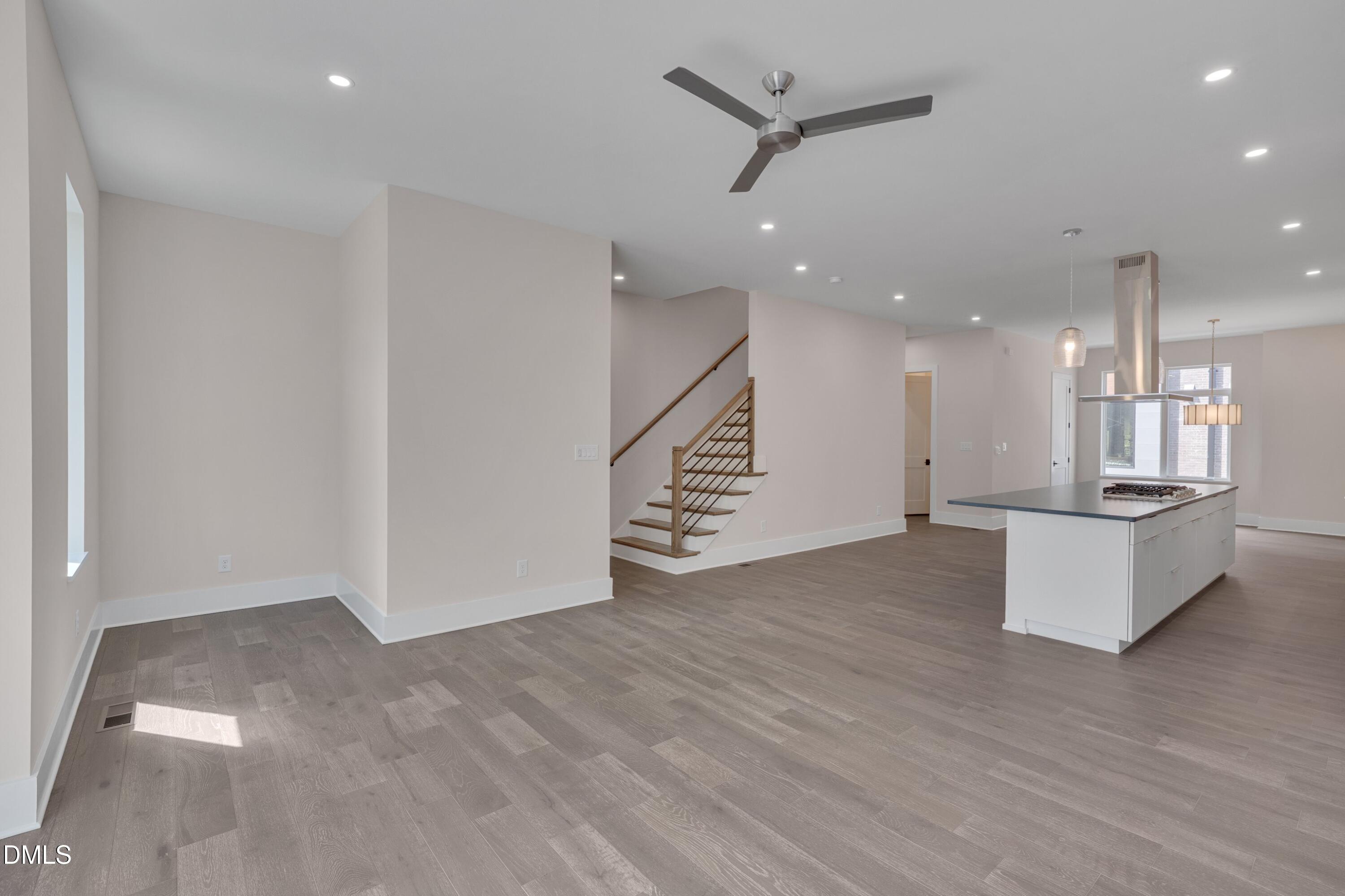 1014 Manor Way Durham, NC 27701 - Photo 20 of 38 a view of kitchen and hall with wooden floor
