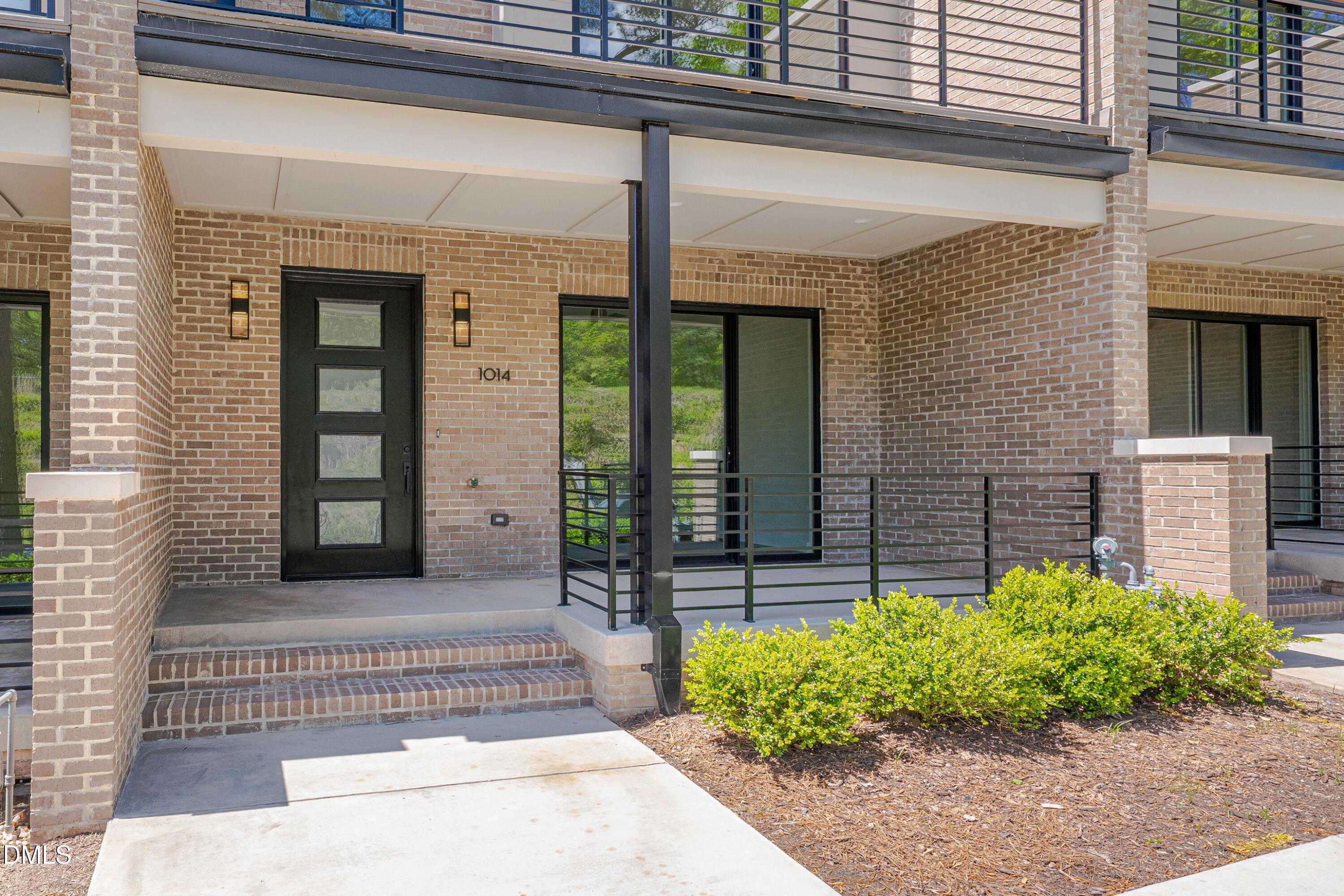 1014 Manor Way Durham, NC 27701 - Photo 7 of 46 a front view of a house