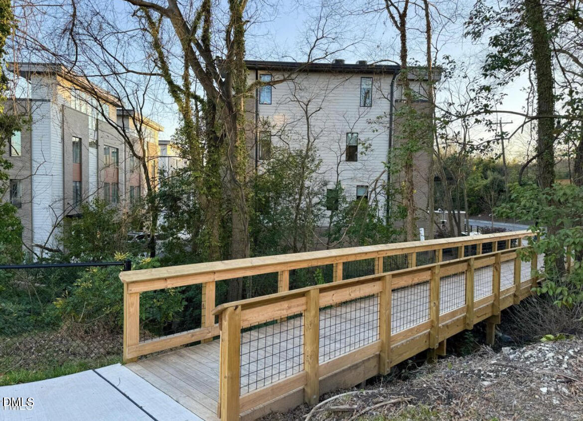 1014 Manor Way Durham, NC 27701 - Photo 8 of 46 a view of a balcony with wooden fence