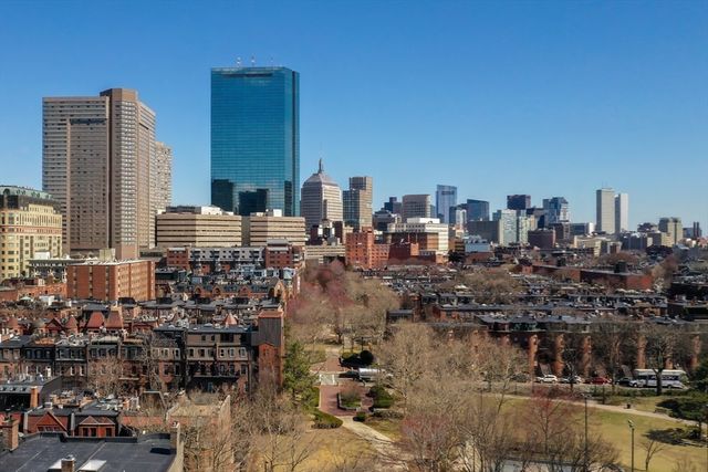 a city view with tall buildings