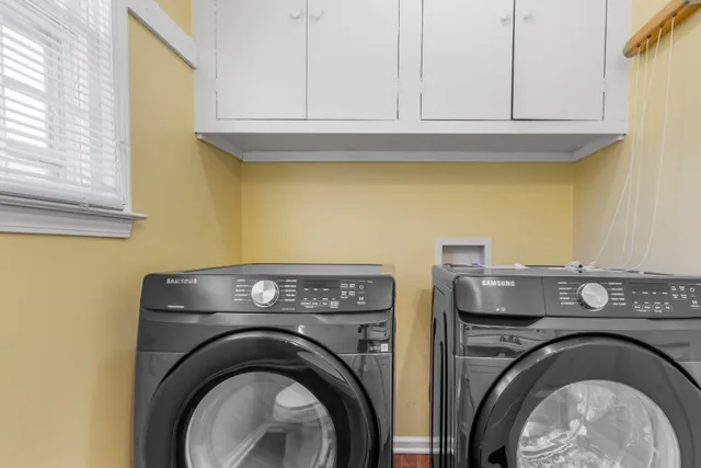 a utility room with dryer and washer