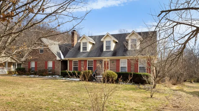 a view of a house with snow on the wall