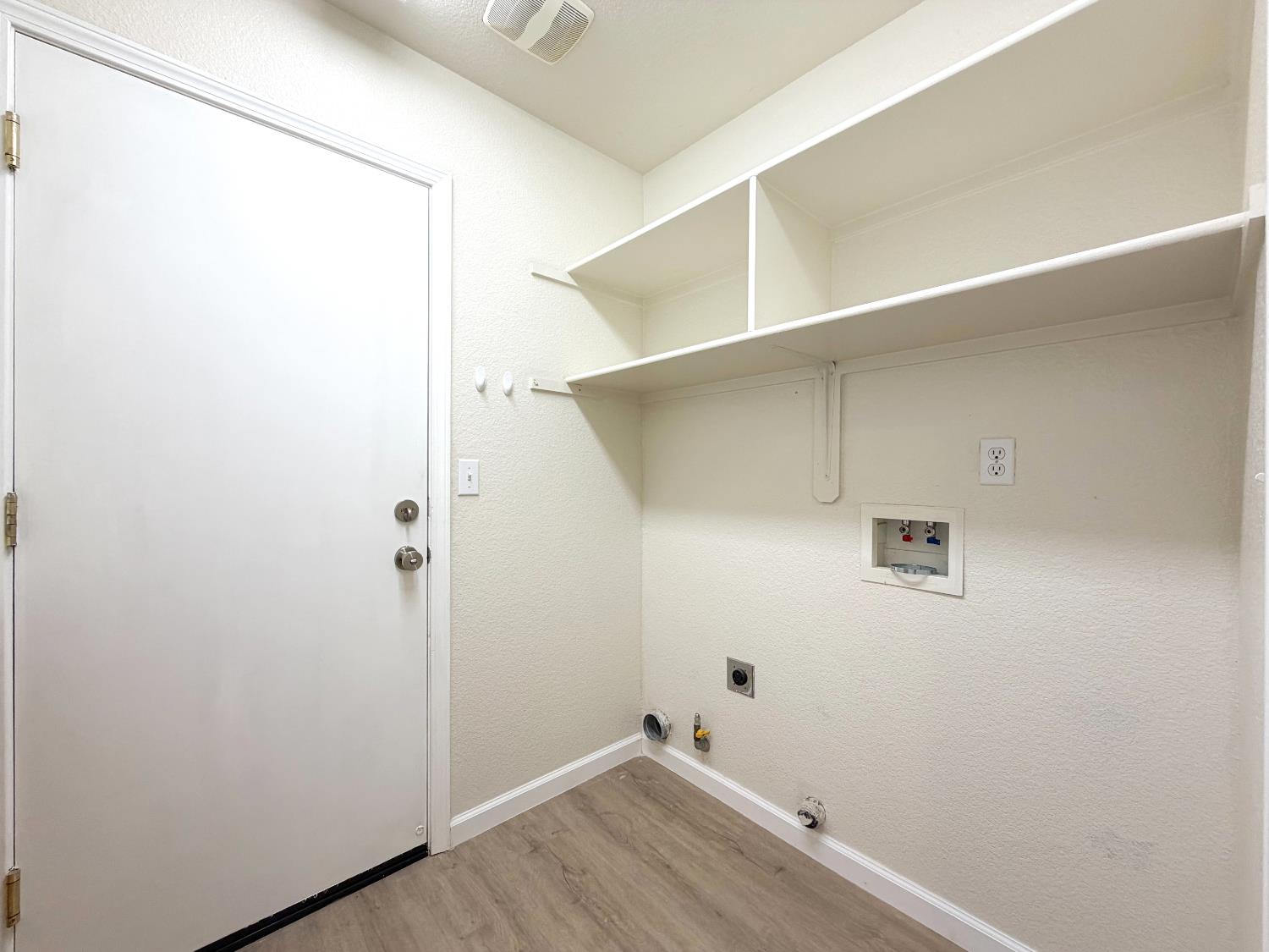 7948 Cavalier Way Sacramento, CA 95832 - Photo 15 of 17 a view of small space with wooden floor