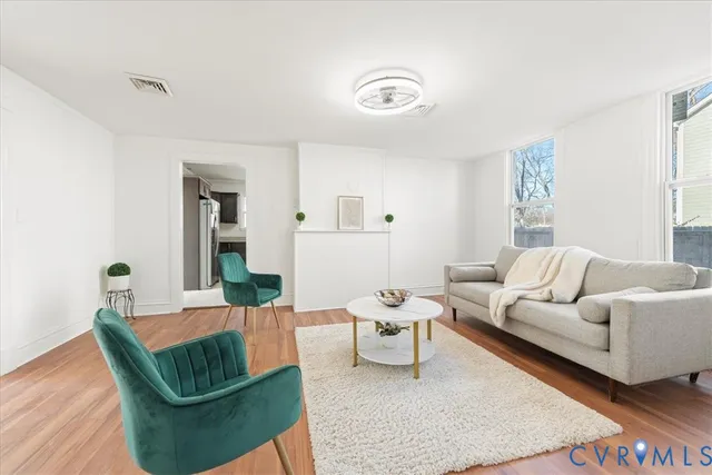 a living room with furniture and a couch