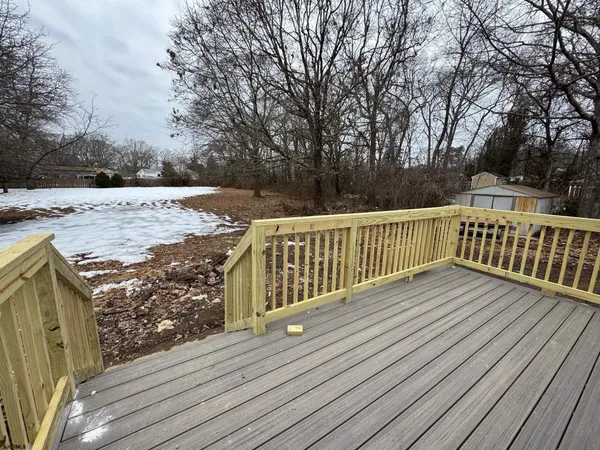 a view of deck and wooden floor