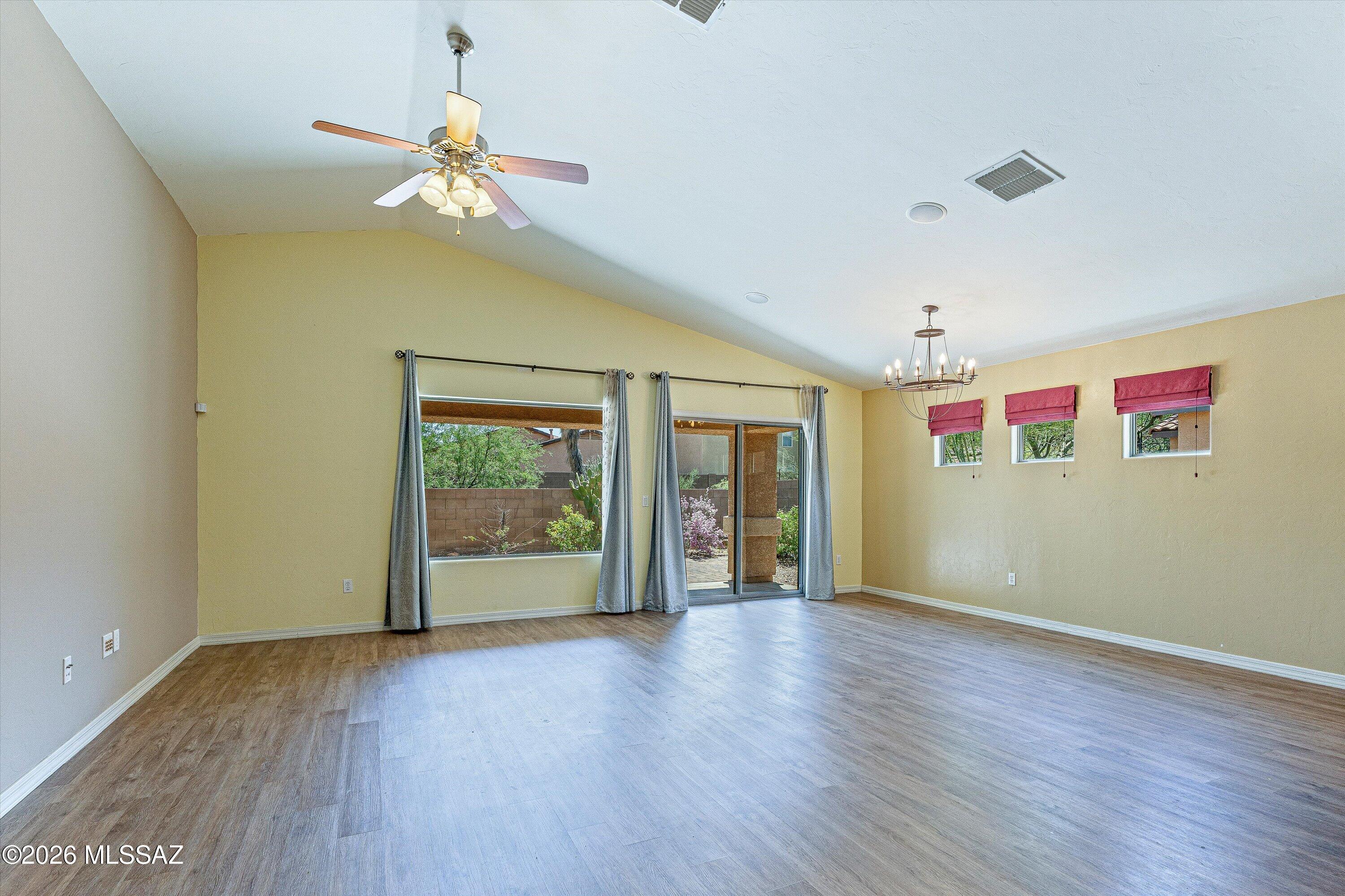 513 South Stone Bench Road Vail, AZ 85641 - Photo 7 of 39 Spacious living room with abundant natural light.