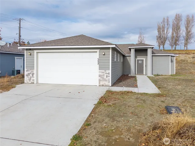 a view of a house with a garage