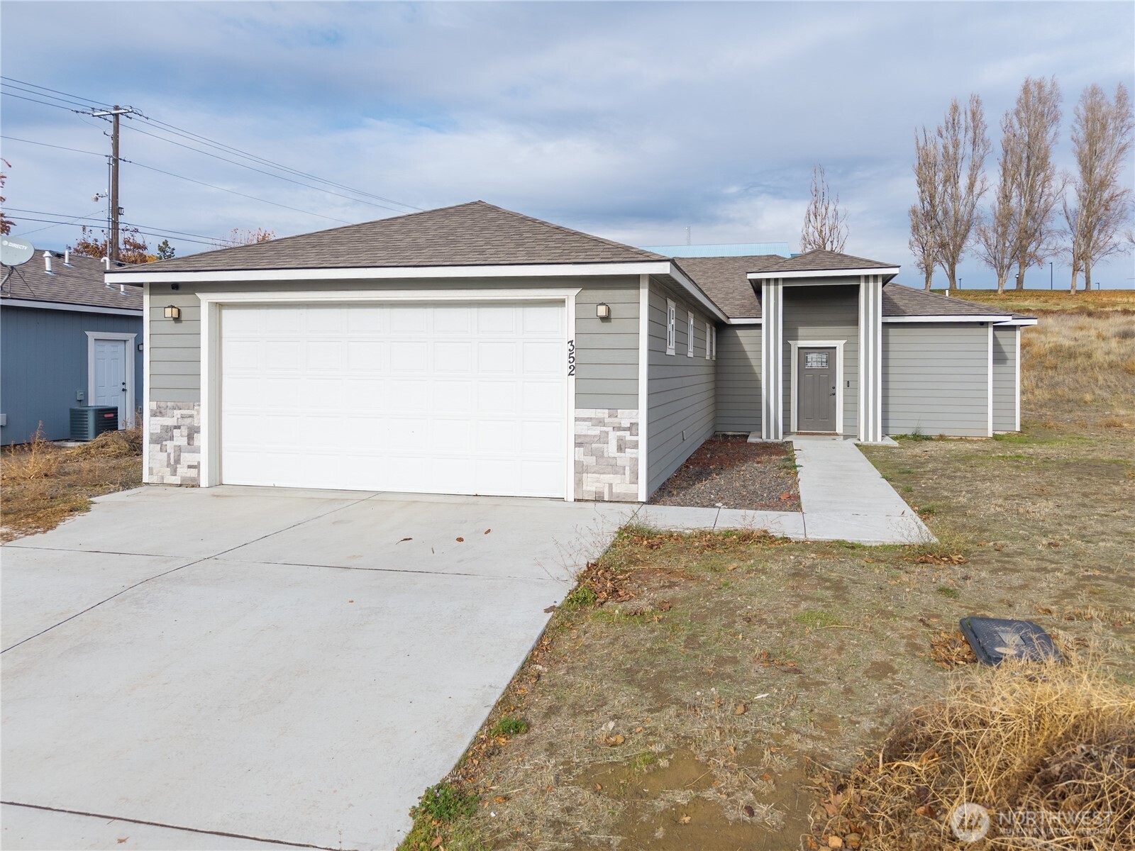 a view of a house with a garage