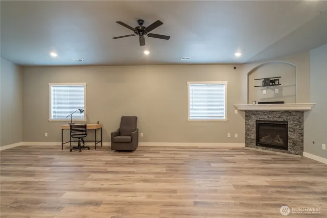 a bathroom with a toilet a sink and a mirror