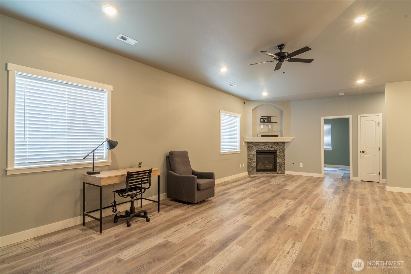 352 East Davis Street Connell, WA 99326 - Photo 17 of 35 a view of a livingroom with furniture and a ceiling fan
