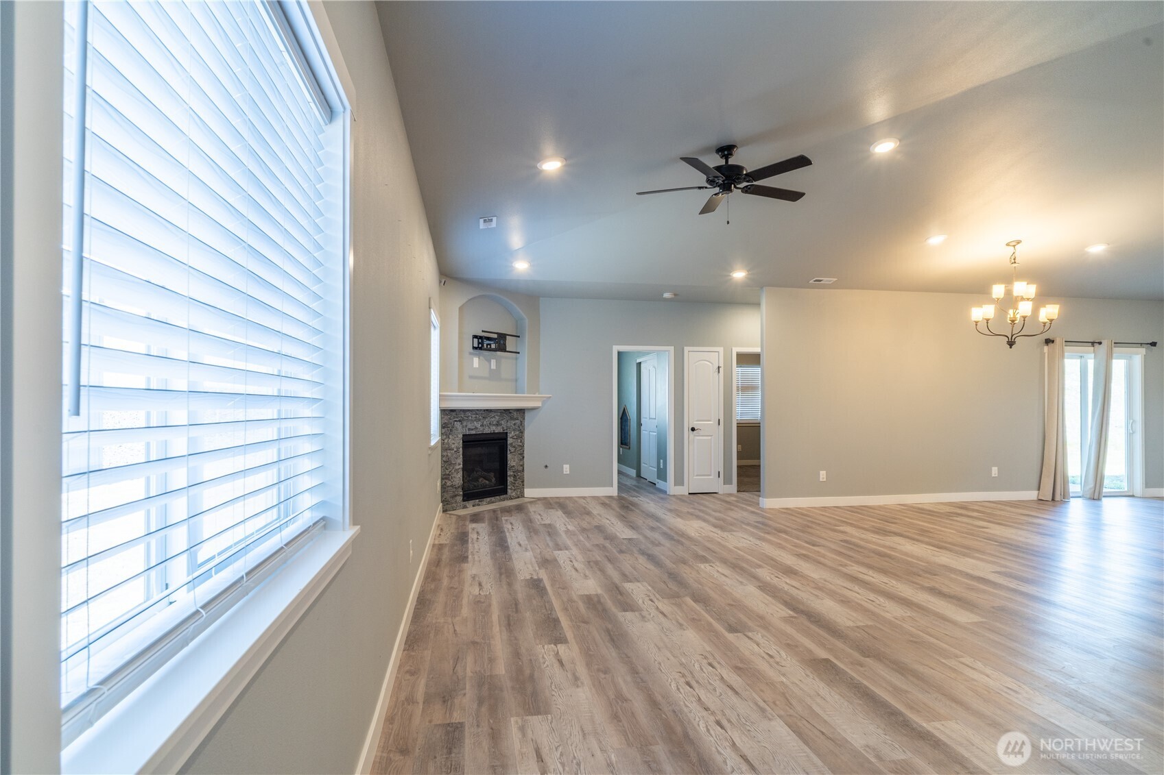 352 East Davis Street Connell, WA 99326 - Photo 20 of 40 wooden floor in an empty room with a fireplace