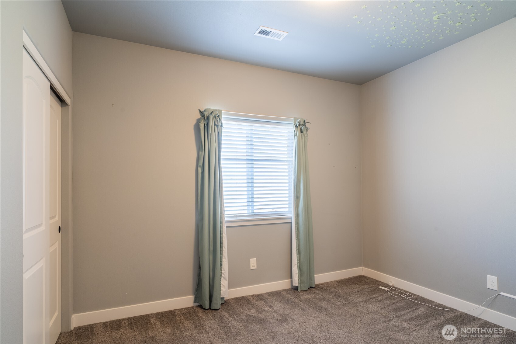 352 East Davis Street Connell, WA 99326 - Photo 28 of 40 a view of an empty room with a window
