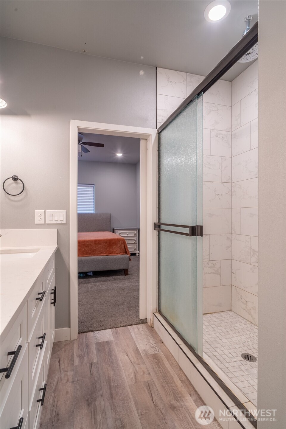 352 East Davis Street Connell, WA 99326 - Photo 32 of 35 a bathroom with a double vanity sink and mirror